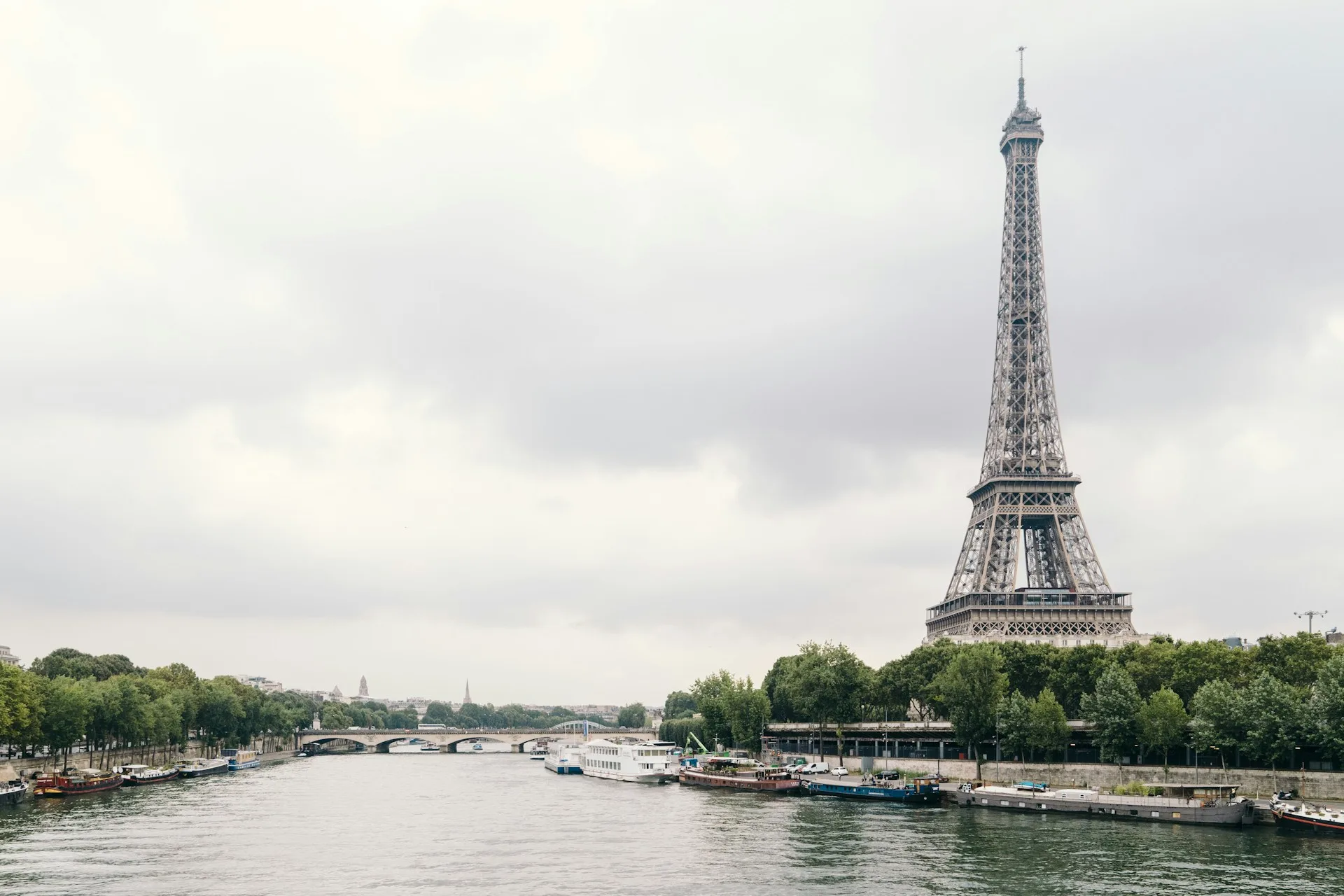 The Seine River flowing through Paris at dusk