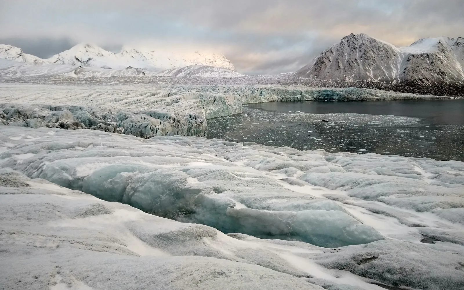 An expedition ship among Arctic pack ice off Svalbard