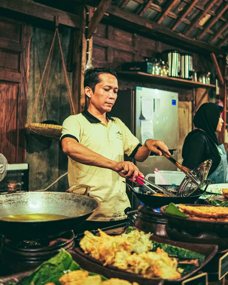 Cooking in the family compound, Bali