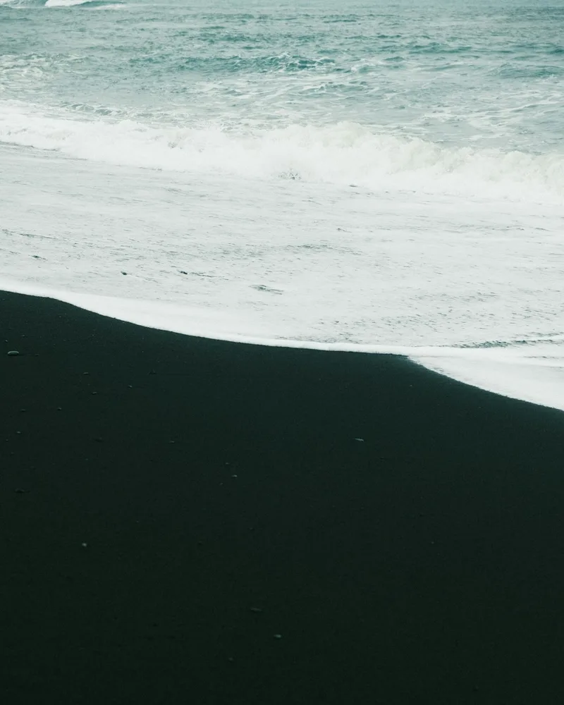 A black-sand beach, French Polynesia