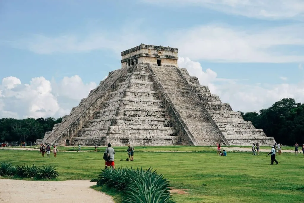 Maya ruins in Mexico showcasing ancient stone structures, including temples and pyramids.