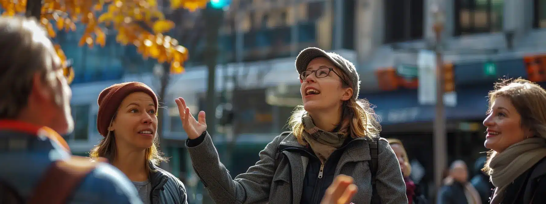 a knowledgeable guide gesturing enthusiastically as they share captivating stories with a group of engaged participants during a guided walking tour in cleveland.