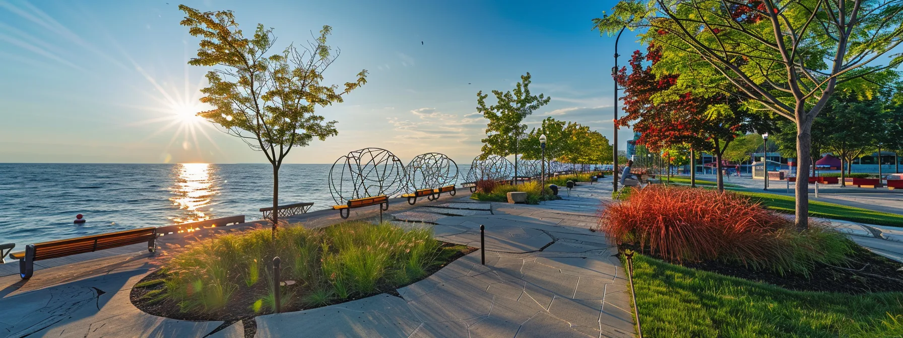 a picturesque view of the lake erie waterfront promenade with vibrant art installations and serene park surroundings.