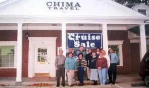 The Chima Travel team outside the Sand Run Road office