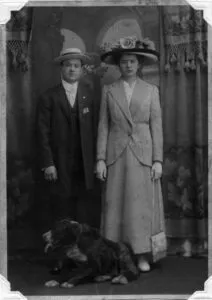 Peter and Mary Chima, with a dog